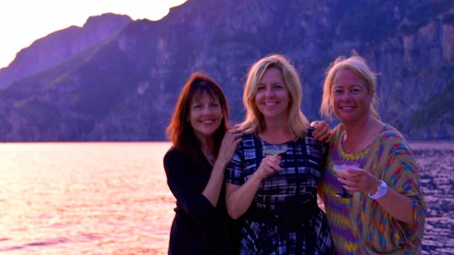 A gorgeous sunset in Paradise. Near the town of Positano, friends share a lifelong memory.